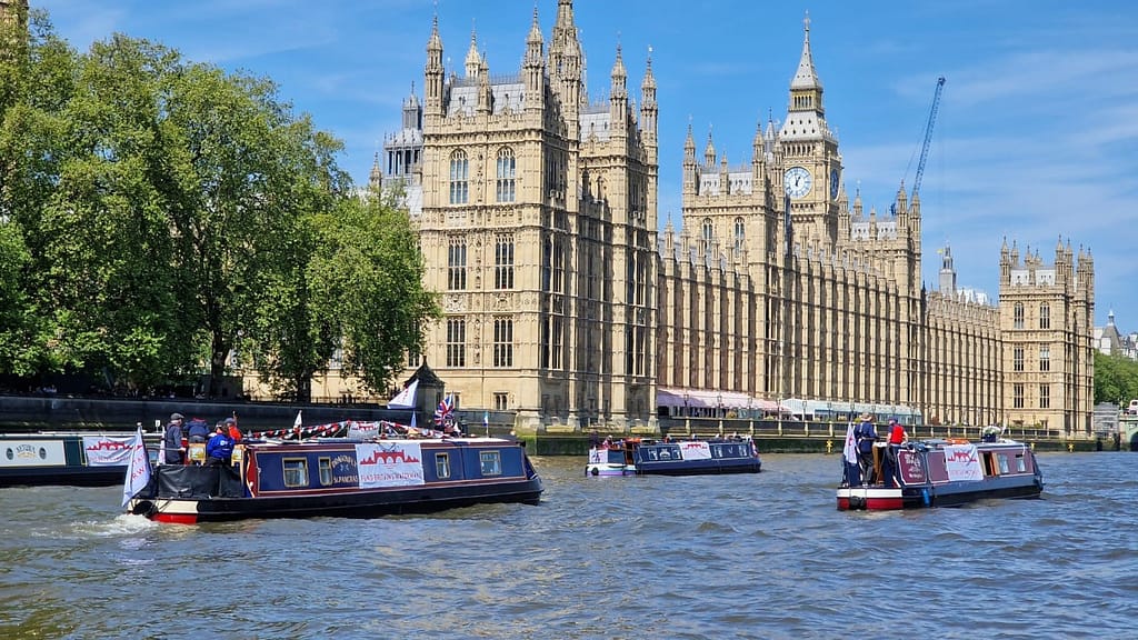 Campaign boats cruising near Westminster