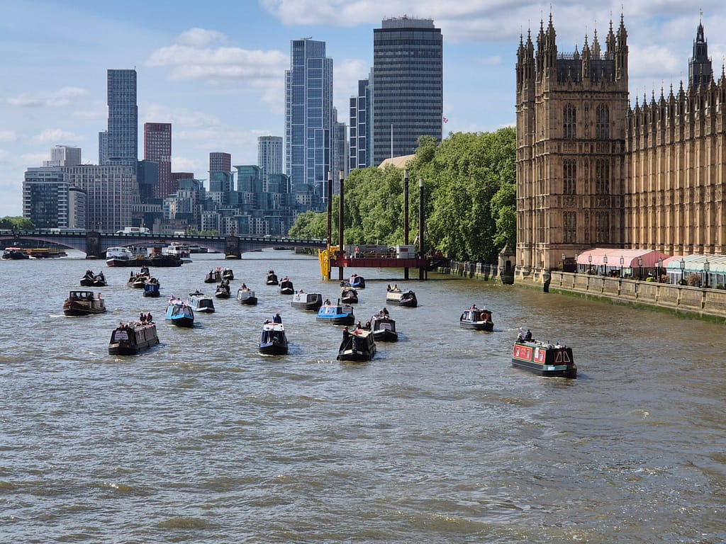 Fund Britain's Waterways flotilla seen from Westminster Bridge