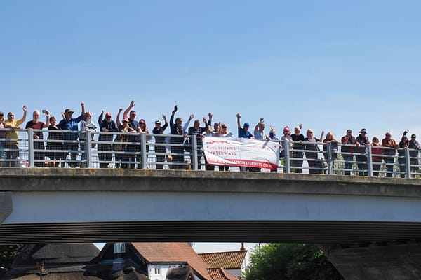 Fund Britain's Waterways Weekend of Action supporters on a bridge